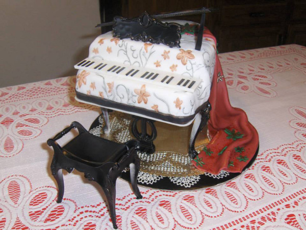 This is a carefully assembled and decorated piano cake created by 2 ½ Cups Cupcakery and Bakeshop in Marshfield. (Submitted photo)