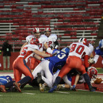 Hunter Luepke’s 4th-and-goal run ends in a fumble before he broke the plane as the Rockets lost to Amherst 42-0 in the WIAA Division 5 State Championship Game at Camp Randall Stadium in Madison, Thursday, Nov. 19, 2015.