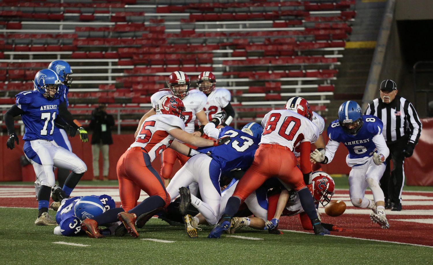 Hunter Luepke’s 4th-and-goal run ends in a fumble before he broke the plane as the Rockets lost to Amherst 42-0 in the WIAA Division 5 State Championship Game at Camp Randall Stadium in Madison, Thursday, Nov. 19, 2015.