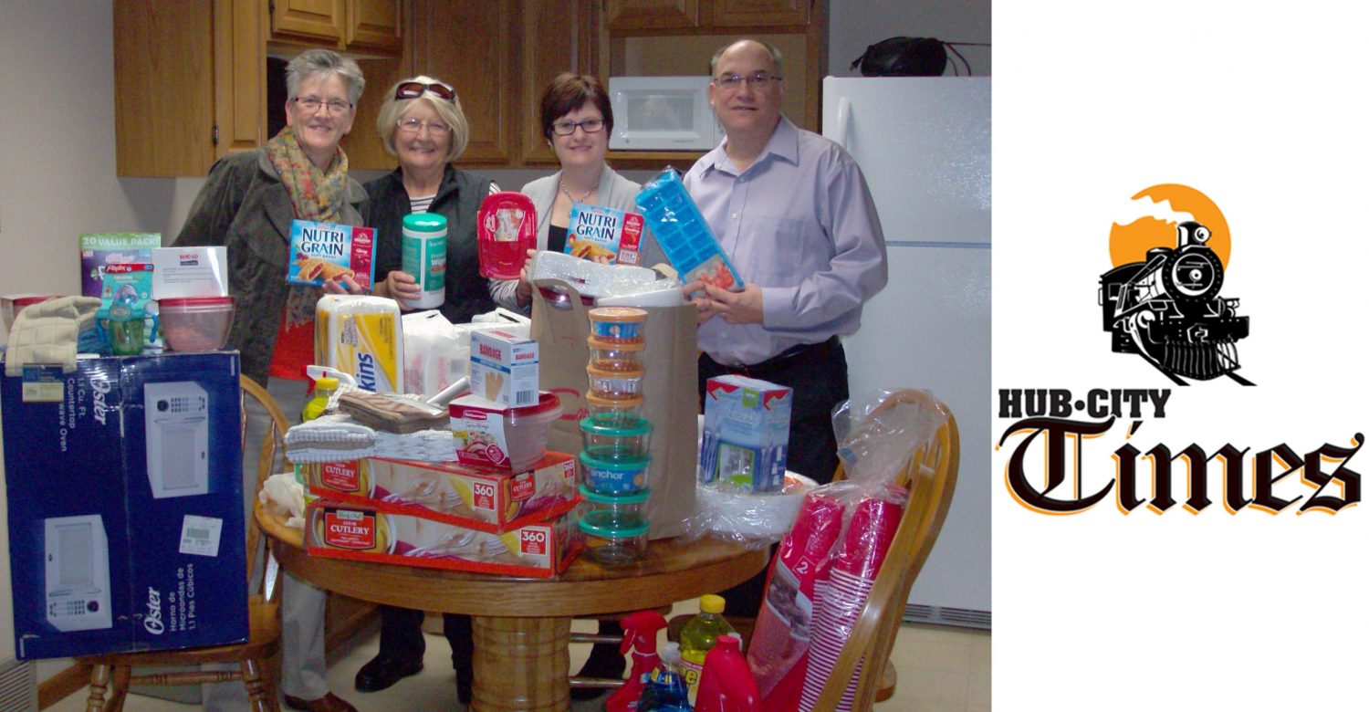 Pictured, left to right, with many of the items delivered on Oct. 21 are Altrusa members Kathy Phillips and Darlene Krake, Executive Director of PDC Renee Schulz-Stangl, and CFV Program Coordinator Steve Fleischmann.