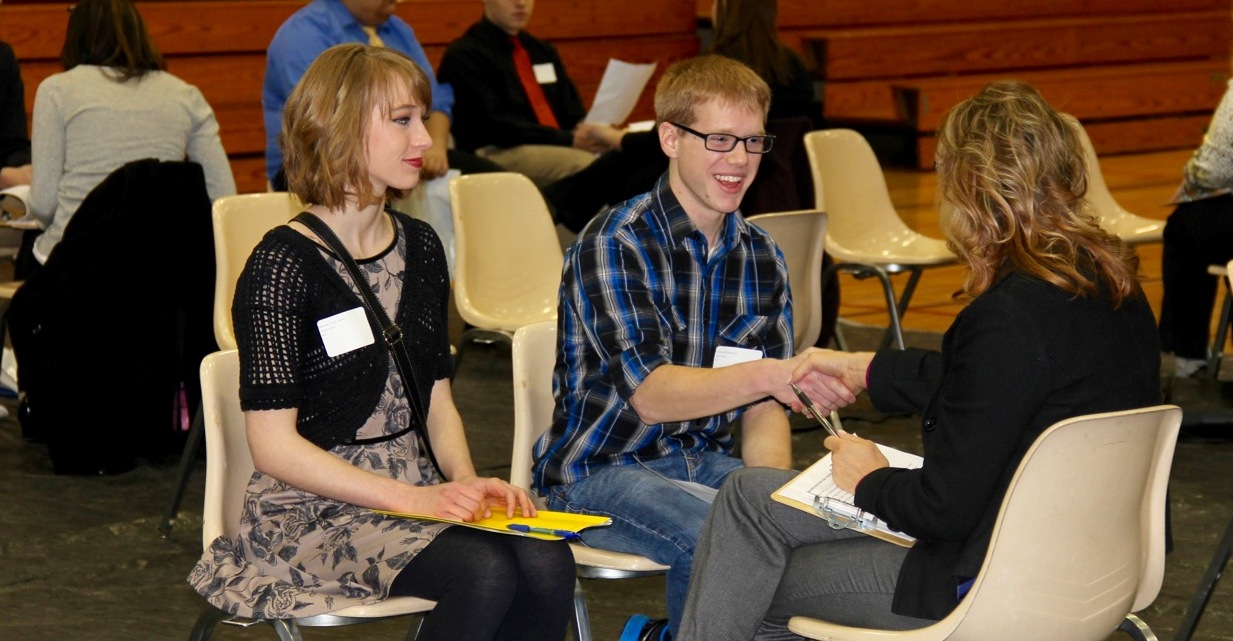 Marshfield High School juniors Masie Cramer and Kyler Jahner take part in a mock interview with Marsha Bushman from Prevention Genetics at Xtreme Xploration at UW-Marshfield/Wood County.