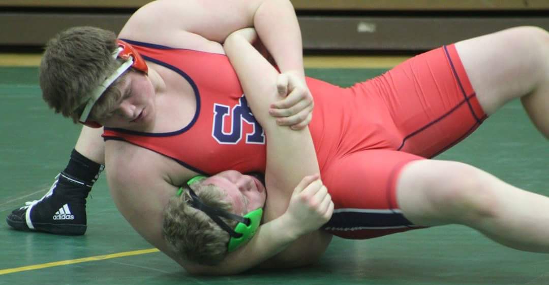 Spencer/Columbus Catholic’s Logan Zschernitz pins an opponent during a recent match against Edgar. Zschernitz is 29-5 as a 285-pounder heading into Saturday’s Cloverbelt Conference Tournament.