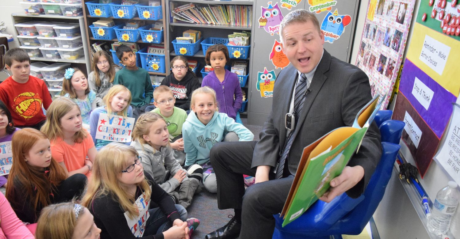 Marshfield Mayor Chris Meyer reads to Washington Elementary students as part of Drop Everything and Read Day.