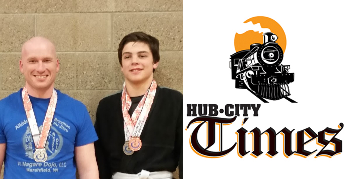 Jason Tucker, left, and Kade McManus pose with medals they earned at the the St. Croix Grappling Games on April 30.