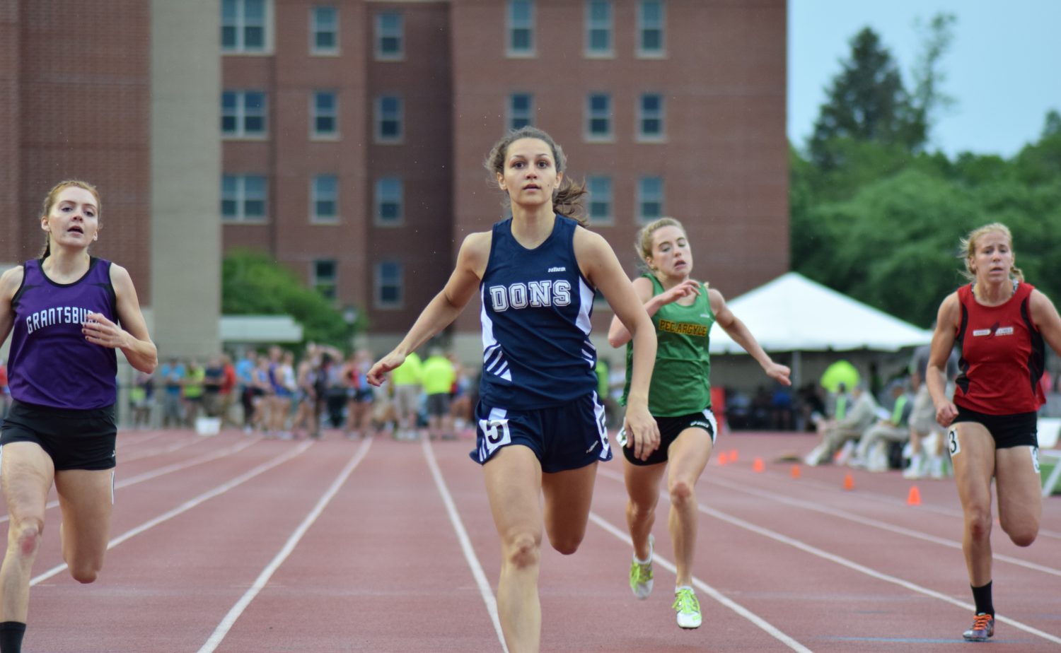 Marshfield Columbus Catholic’s Alexandra Hutchison wins the 200-meter dash at the 2016 WIAA State Track & Field Championships at the University of Wisconsin-La Crosse on Friday. She had the top time in preliminaries (25.17) to qualify for Saturday’s final.