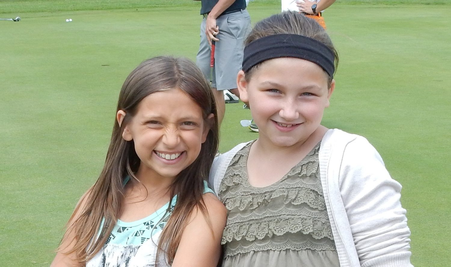 Pictured are Youth Net participants Kylie Demers (left) and Michayla Lingford at RiverEdge Golf Course last summer. The children involved in Youth Net received golf lessons on this day.