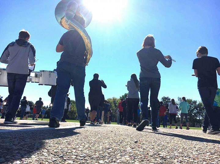 The Marshfield High School band practices its halftime routine for the homecoming game Oct. 7.