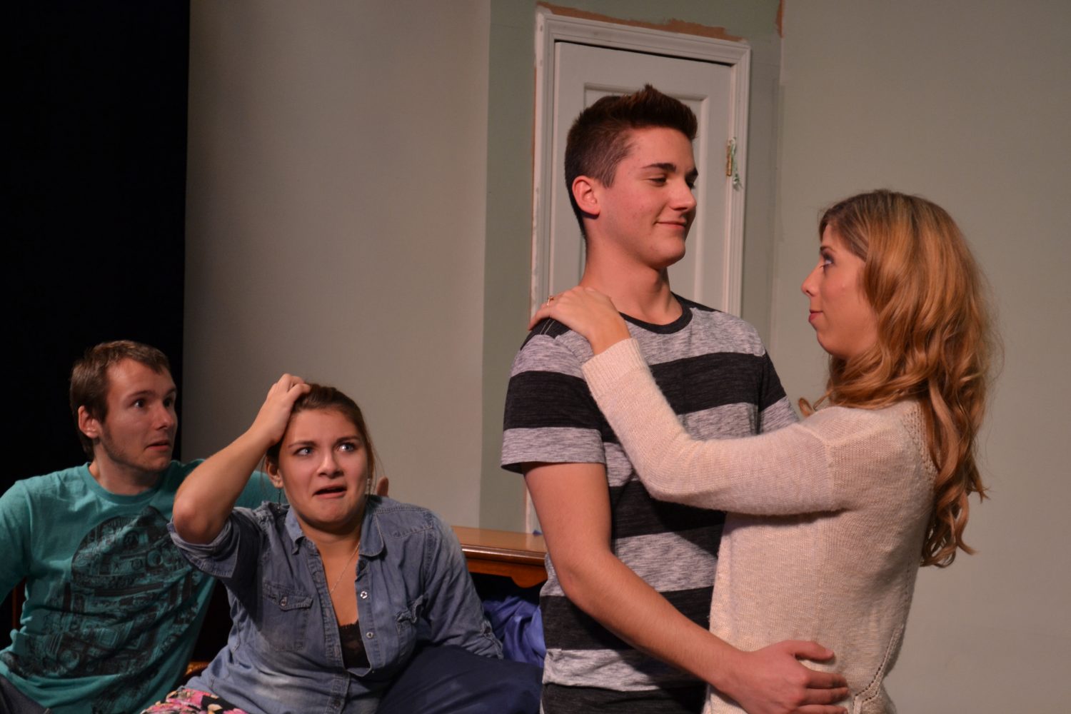 From left: Zachary Gotz and Bridget Donahue look on in shock as Marshall Van Over and Jillian Jackan reconcile after a fight in Bedroom Farce, the upcoming comedy to be presented at UW-Marshfield/Wood County.