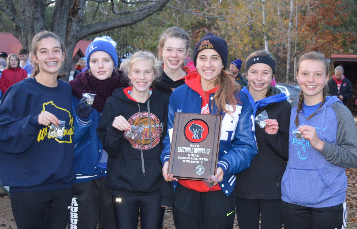 The Auburndale girls cross country team finished second at the WIAA Division 3 sectional at Nine Mile Recreation Area in Rib Mountain on Oct. 21, earning a spot in Saturday’s WIAA State Cross Country Meet. Team members are, from left, Isabella Jewell, Anna Kollross, Vanessa Mitchell, Emmalee Richardson, Kali Karl, Taylor Stanton, and Julianna Kollross.