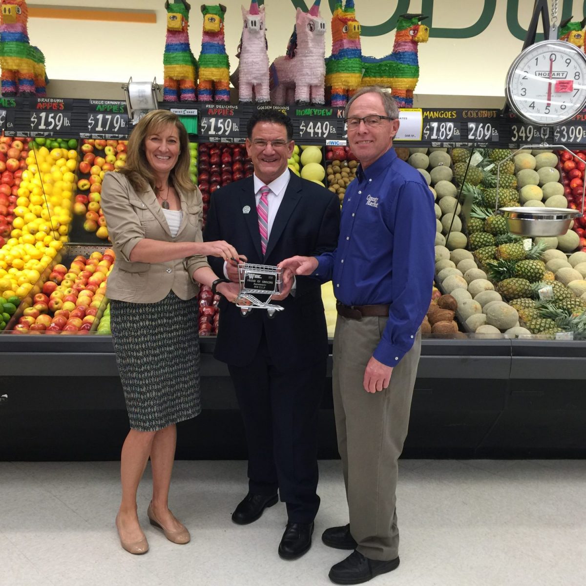 Representative Kulp was presented with the Friend of Grocers Award from the Wisconsin Grocers Association at Kramer’s County Market in Abbotsford. Pictured are: Michelle Kussow, WGA; Kulp; Dennis Kramer, Kramer's County Market. Submitted photo.