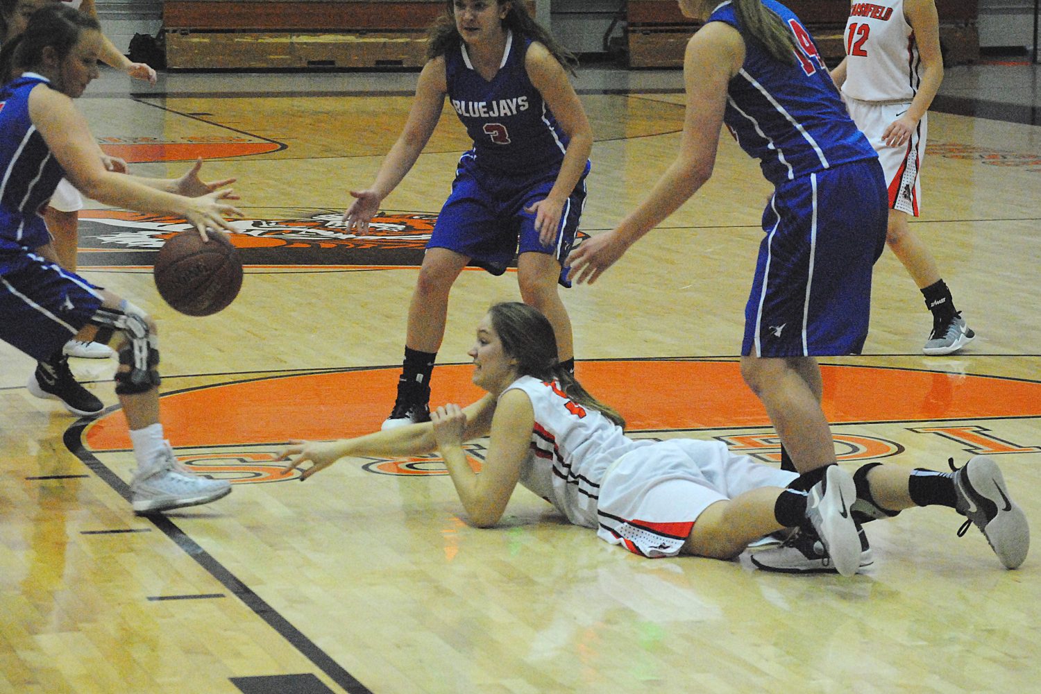 Marshfield's Sophie Koehn tries to chase down a loose ball during the Tigers' win over Merrill on Tuesday at Marshfield High School.