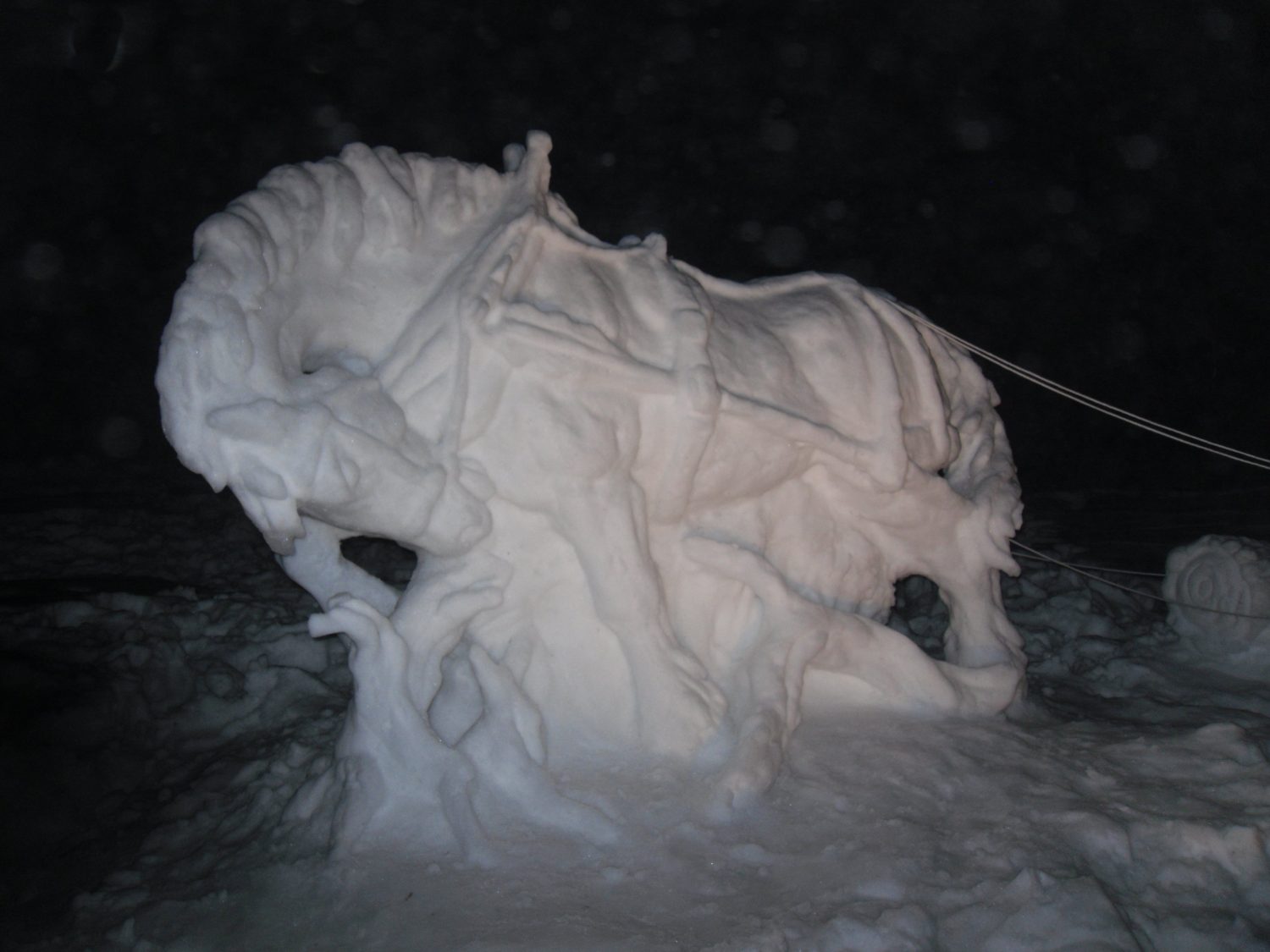 Deborah Lenz recently created a snow sculpture titled "Logger in the Snow."