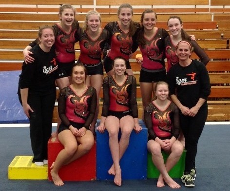 The Marshfield gymnastics team set a new school record for points with 130.5 during a dual meet against Ashland on Thursday. Team members are, in front from left, Makenna Gramza, Melanie Hafenbredl and Isabelle Jensen. In back from left: head coach Allie Dryer, Ally Bakke, Emma Haugen, Macey Smith, Ciera Neufeld, Bailey Schmitt, and assistant coach Becky Holland.