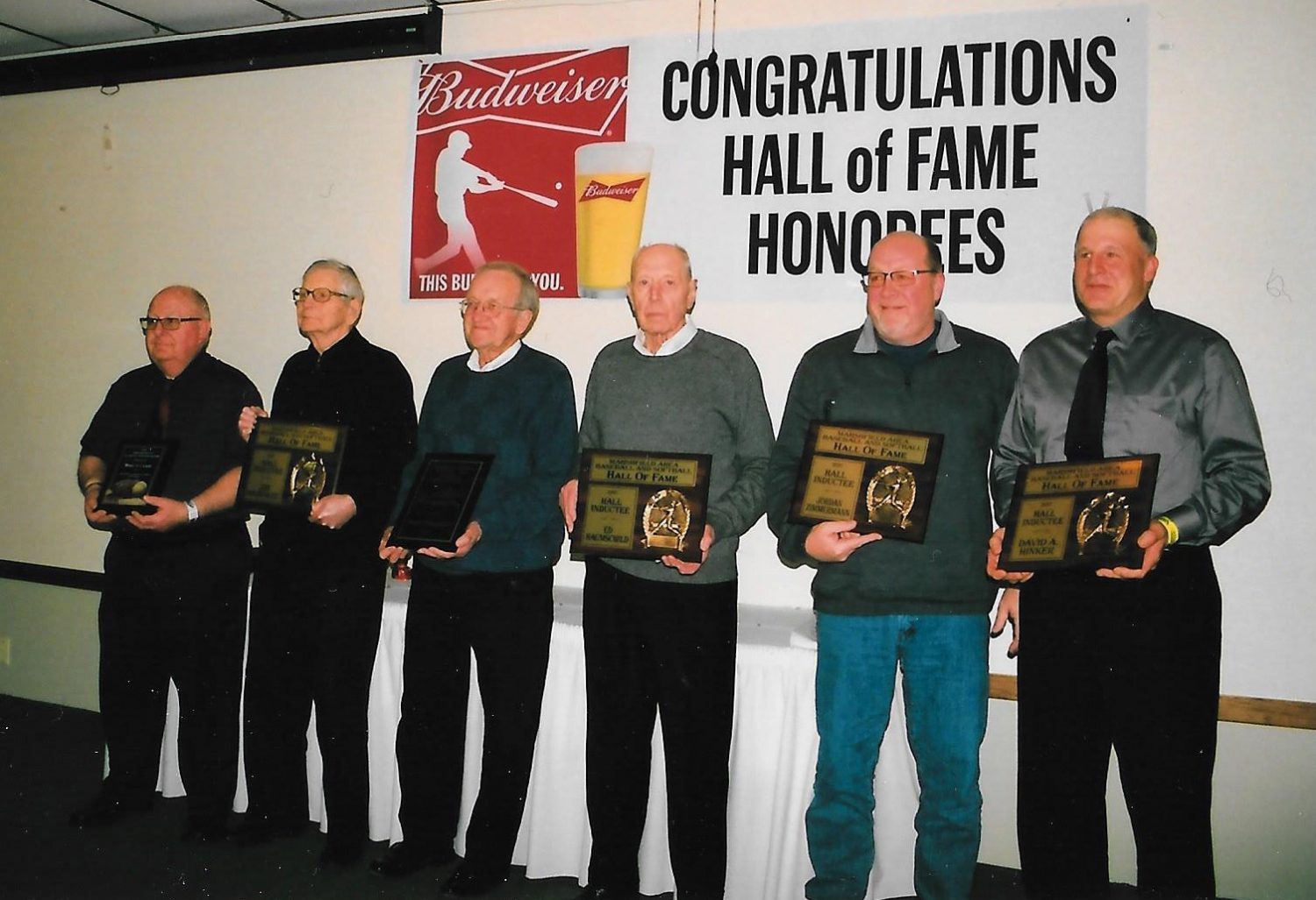 From left: Marlyn Laabs; Jim Parmalee; Marvin Kohlbeck; Ed Haumschild; Jeff Zimmermann, receiving the plaque on behalf of his son Jordan; and David A. Hinker were honored by the Marshfield Area Baseball and Softball Hall of Fame on Jan. 28.