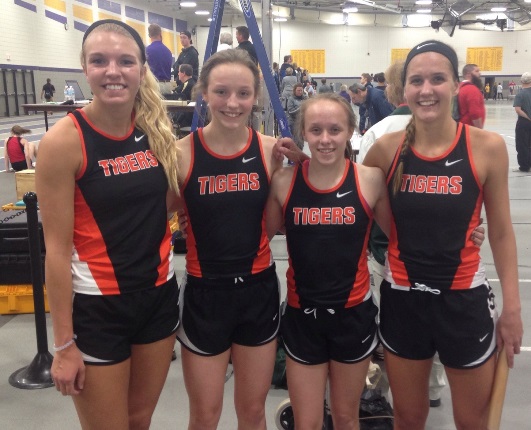 From left: The Marshfield girls 1,600-meter relay team of Alexa Aumann, Kaydee Johnson, Gracie Holland, and Maddie Nikolai set a new school indoor record with a time of 4:18.80 on Tuesday at the 2017 Wisconsin Valley Conference Indoor Track & Field Meet at the University of Wisconsin-Stevens Point.