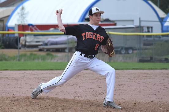 tratford pitcher Lance Heidmann delivers to the plate during the Tigers’ win over Auburndale on Friday. Heidmann tossed three hitless innings to earn the save.