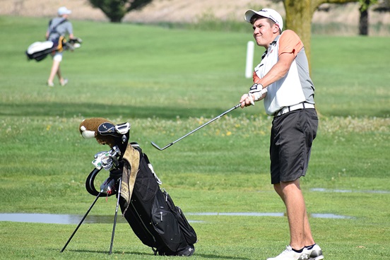 Marshfield’s Derek Michalski chips up to the green on hole No. 5 during the Wisconsin Valley Conference Tournament meet at RiverEdge Golf Course in Marshfield. Michalski shot an 80 to finish in a tie for seventh place.