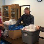 From left: Arnie Mancl, Marshfield Police Lt. Darren Larson, and Kathy Leick sort and prepare submitted drugs before sending them off to be incinerated.
