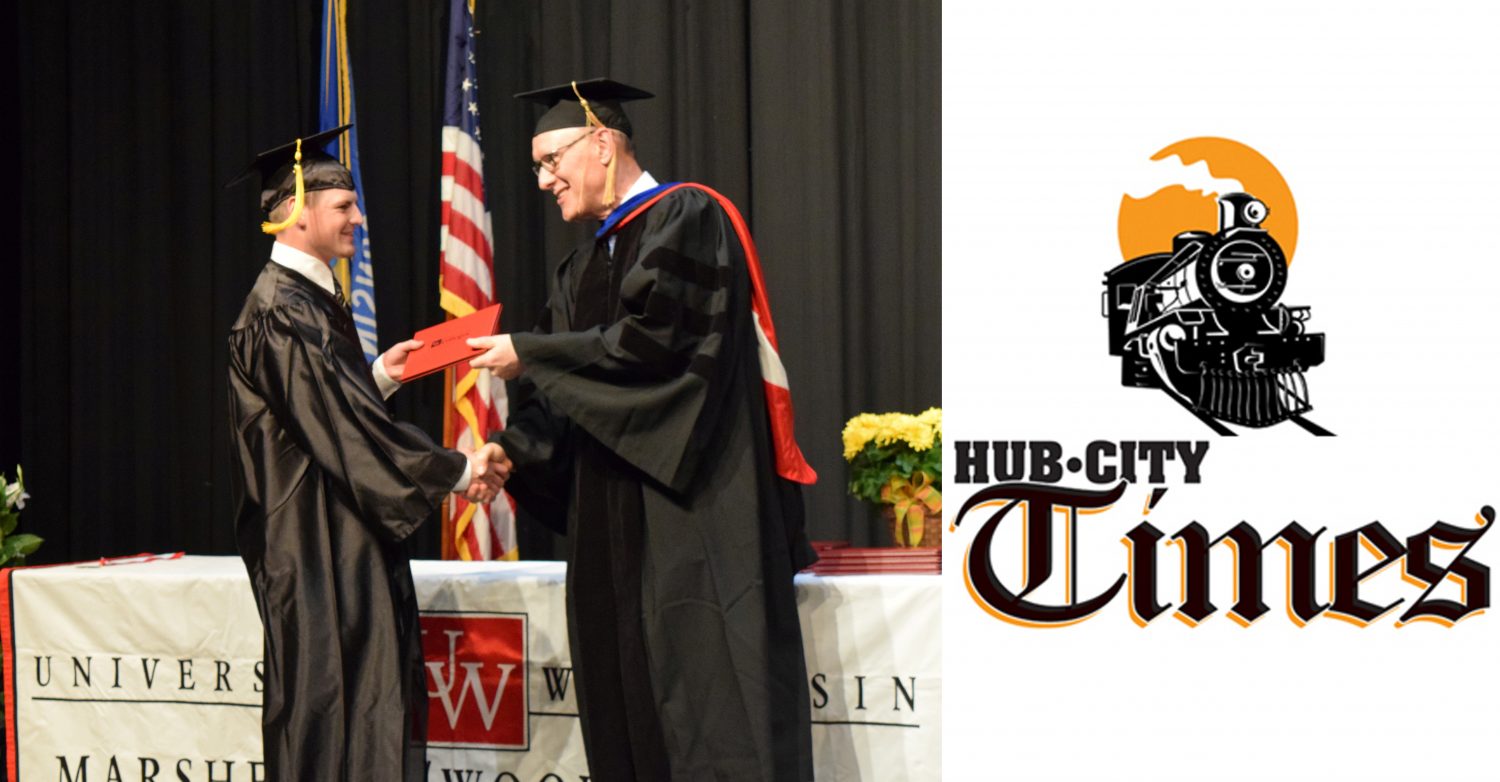 Regional Dean Keith Montgomery, right, congratulates Daniel Wilke of Spencer on his Associate of Arts & Sciences degree at the UW-Marshfield/Wood County commencement ceremony on May 19.