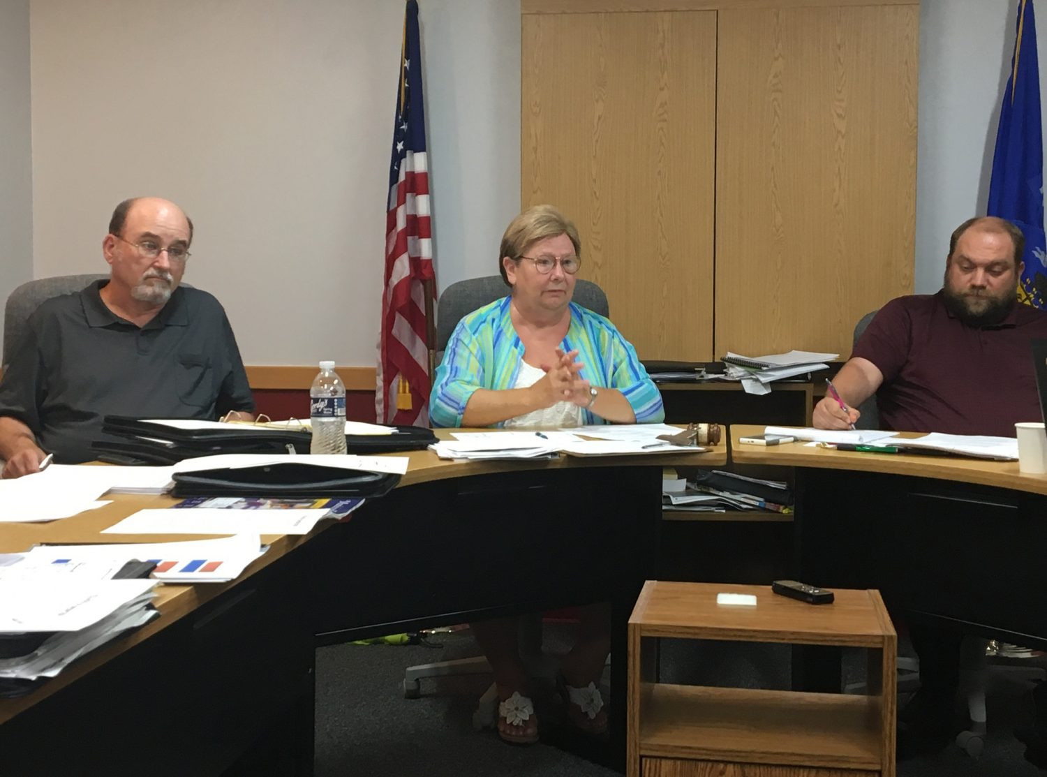 From left: Spencer Village Trustee Harry Toufar, President Pauline Frome, and Clerk Paul Hensch listen to discussion on the proposed ATV ordinance at a June 12 meeting.