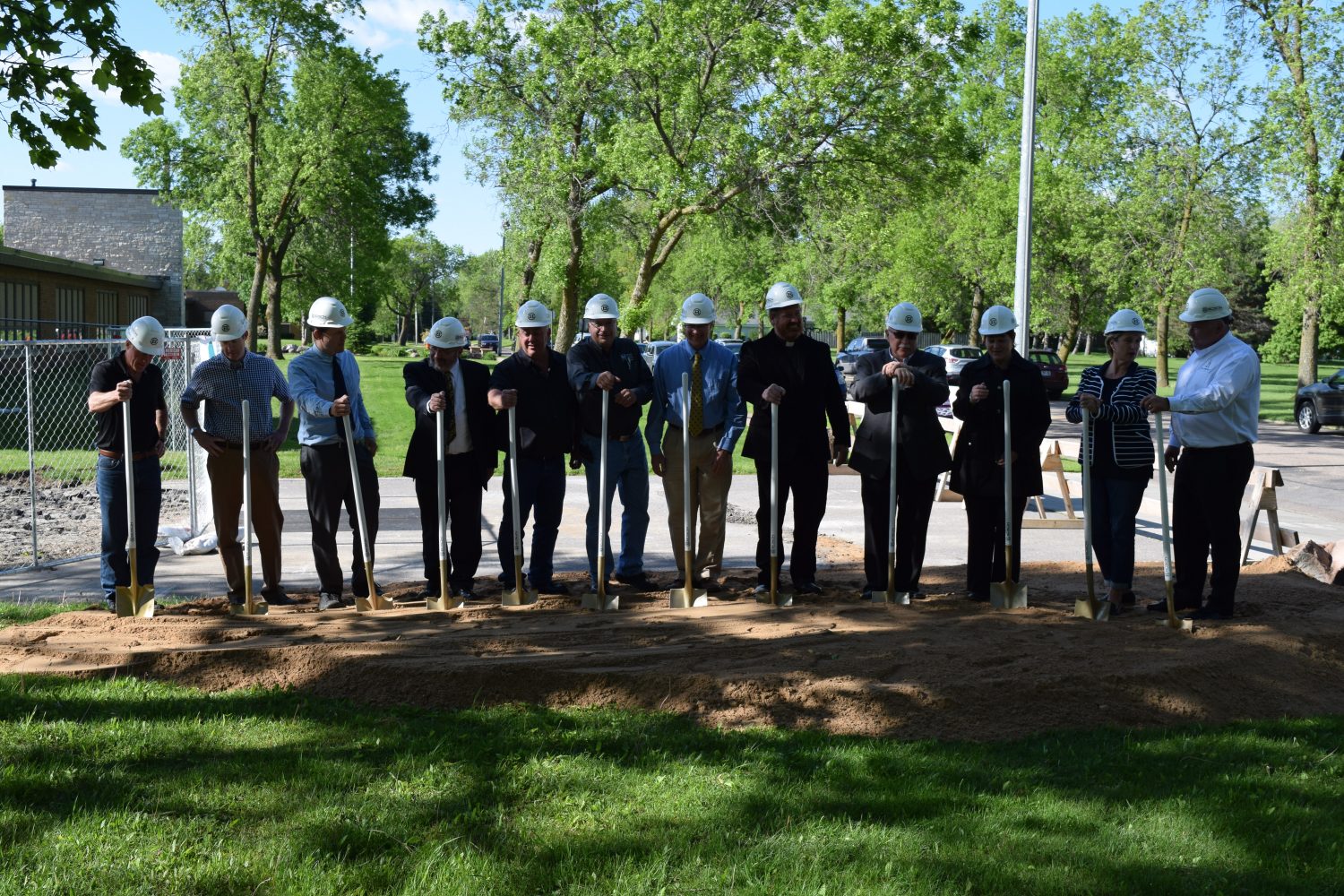 Marshfield Columbus Catholic officials, donors, and contractors broke ground on the new science lab addition on May 31.