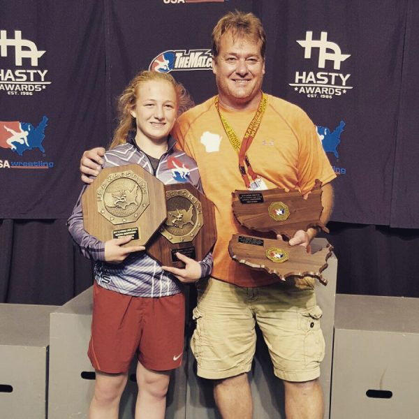 Macey Kilty poses with her father, Pat, after winning both the cadet and the junior divisions at the U.S. Marine Corps Cadet and Junior Nationals in Fargo, North Dakota, held July 14-22. Macey was also named Outstanding Wrestler in both divisions.