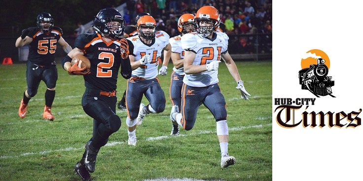 Marshfield running back Brant Bohman rips off a long run during the second quarter of the Tigers’ 27-14 win over Kaukauna on Friday night at Beell Stadium.
