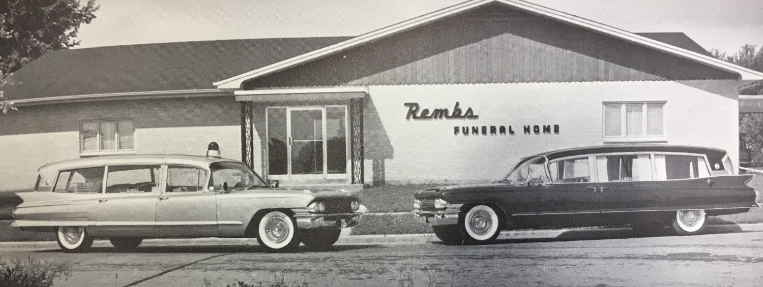 The September 1961 grand opening of the new Rembs Funeral Home featured two Cadillac Superiors.