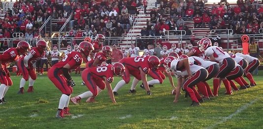 The Spencer/Columbus defense lines up against Neillsville/Granton during the first quarter of Friday’s game at Spencer High School. The Rockets rolled to a 62-8 victory.