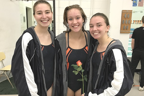 The Marshfield girls swim team celebrated Senior Day at its home meet on Thursday. The Tigers’ three seniors are, from left, Erika Roeglin, Sophie Koehn and Elizabeth Lecker.