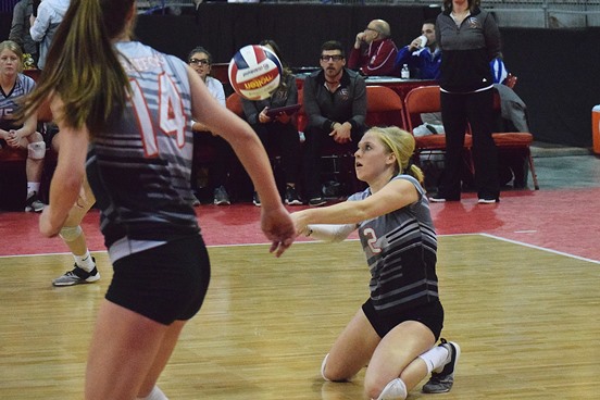 Stratford’s Madisyn Daul digs out a shot from Regis during the fourth set of the Division 3 semifinal match Friday at the WIAA State Girls Volleyball Tournament at Resch Center in Green Bay.