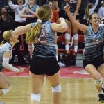 From left: Madisyn Daul, Brooke Peterson, and Mazie Nagel yell after Stratford clinched the first set of its Division 3 semifinal on Friday at the WIAA State Girls Volleyball Tournament at Resch Center in Green Bay. Regis went on to win the match 3-2.