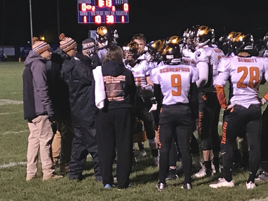 The Stratford football team huddles during a timeout early in its WIAA Division 5 Level 3 playoff game at Amherst on Friday. Amherst won 52-15, ending the Tigers’ season.